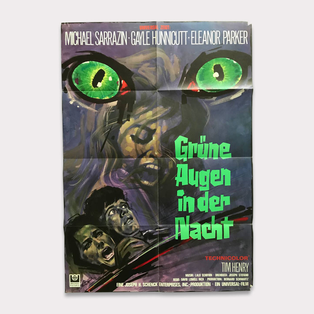 Grüne Augen in der Nacht